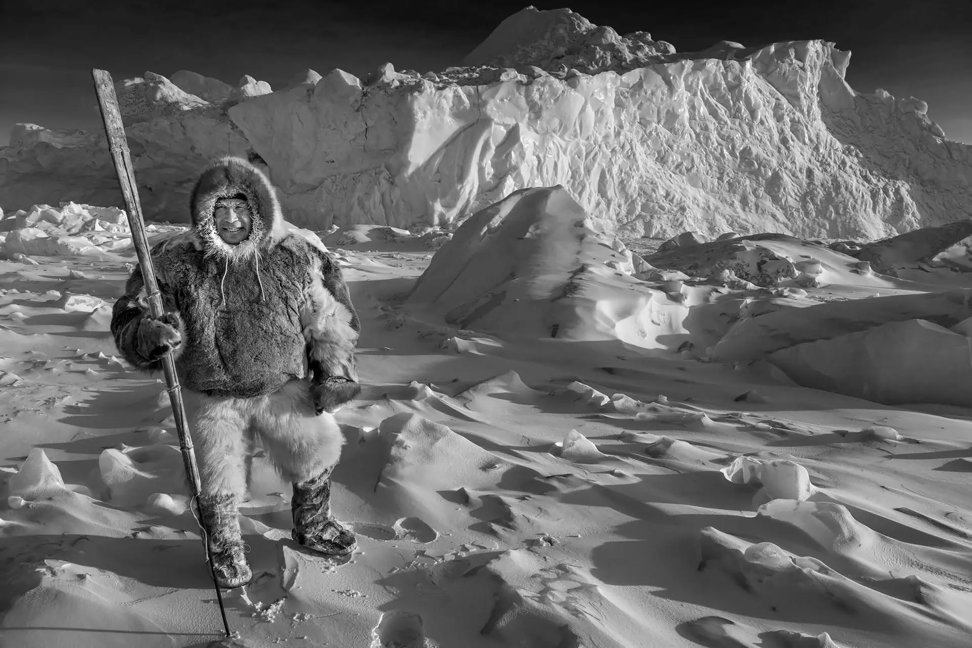Man dressed in fur in the snow
